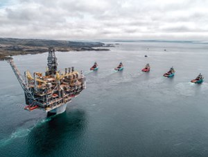 Fig. 3. The nearly two-week tow-out of the 750,000-ton Hebron platform began on June 3, and involved up to 10 large, tug supply vessels. Photo: ExxonMobil Canada Properties.