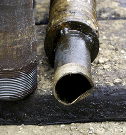 Fig. 10. Anode damaged in BOP stack. Sensor failed 48 hr after startup. Fig. 10. Anode damaged in BOP stack. Sensor failed 48 hr after startup.