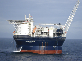 Fig. 7. The Sevan Voyageur FPSO, based on the company’s cylindrical semisubmersible design, is contracted to E.On Ruhrgas UK E&P to work in Huntington field in the UK North Sea, in about 400 ft (120 m) of water. It previously worked in Shelley field before undergoing modifications for its present contract. The FPSO has crude storage capacity of 270,000 bbl and can produce up to 30,000 bopd.