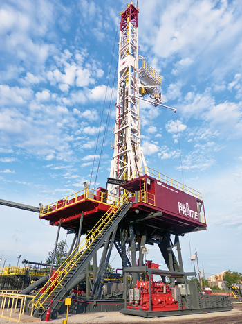 The state-of-the-art NOV Ideal Prime AC rig is engineered with an enhanced setback capacity of 575,000 lb, allowing it to rack more drill pipe for deeper wells and longer laterals. The walking system allows to it move with maximum setback, without rigging up or rigging down. Photo courtesy of National Oilwell Varco.