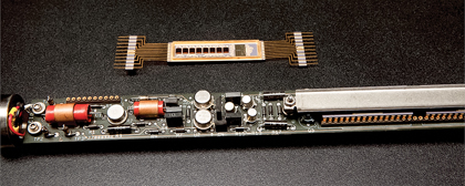 Co-located on a single rugged ceramic substrate, Signature quartz gauge electronics components can withstand the extremes of pressure and temperature for exceedingly long periods. This allows conclusive well test data to be obtained accurately and reliably. Signature gauge electronics (top) are shown in comparison with conventional circuits (bottom).