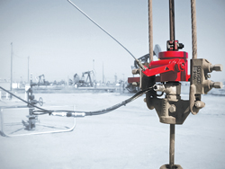 The intelligent rod rotator and load cell are stacked on top of the surface pump bridle. A cable is connected to the pumping unit to operate the rotator, while a signal cable is run from both devices to the rod-pump controller. The intelligent rod rotator and load cell are stacked on top of the surface pump bridle. A cable is connected to the pumping unit to operate the rotator, while a signal cable is run from both devices to the rod-pump controller.