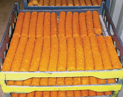 Solidified sticks of treating chemicals are designed to slowly dissolve downhole. Solidified sticks of treating chemicals are designed to slowly dissolve downhole.