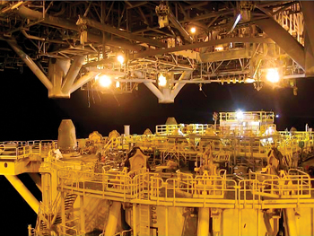Fig. 2. The topsides of Shell’s Perdido spar being lowered into place in March 2009. Fig. 2. The topsides of Shell’s Perdido spar being lowered into place in March 2009.