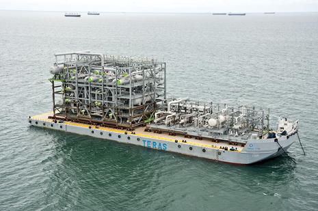 The QCLNG Project marked another milestone on Apr. 3, 2013, with delivery of the largest component, a propane condenser unit, for its LNG plant on Curtis Island, Queensland, Australia (photo courtesy of QCLNG).