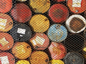 multicolored crude oil barrels