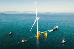 Fig. 3. The Bourbon Orca, flagship of the Bourbon fleet, tows the third floating wind turbine of the WindFloat Atlantic project, off the Portuguese coast.