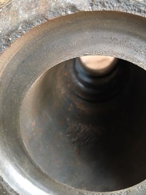 Pitting in the alloy steel material due to high levels of CO2.