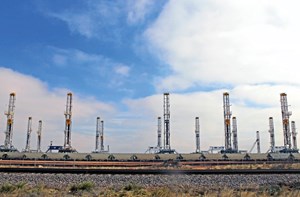 As shown along a major highway in the Midland-Odessa area, operators in the Permian basin of West Texas continue to stack rigs weekly. Photo courtesy of the Midland Reporter-Telegram.