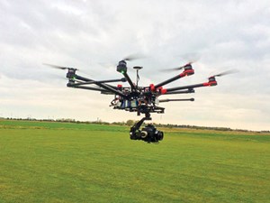 Equipped with an HD camera, an aerial drone can be used to conduct up-close inspection of offshore assets via remote control. Photo courtesy of SkyNetUAVS.