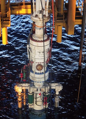 Fig. 1. The Weatherford rotating control device and associated MPD riser joint components, shown after integration into the rig’s riser system, and before being submerged into place.