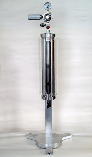 Fig. 2. The acrylic window of the proprietary sand bed test apparatus enables measurement of invasion depth during drilling to be calculated quickly, with “shielding” concentrations adjusted accordingly.
