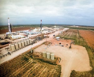 Fig. 3. Four drilling rigs work on a Laredo Petroleum job site in the Permian. During 2017, the rig count in the Permian has exploded, meaning that dayrates for land rigs should increase in the basin during 2018. Photo: Halliburton.