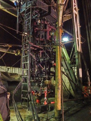 Fig. 4. A rig assisted snubbing unit was installed above the rig floor.