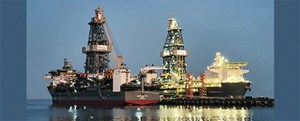 Fig. 00. The industry’s first two 7th Generation drillships, Deepwater Atlas (right) and Deepwater Titan (left), are pictured as they neared completion earlier this year. Image: Transocean.