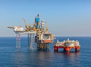 Fig. 1. The Noble Lloyd Noble 4th Generation jackup, designed by GustoMSC and owned by Noble Drilling.  The photo shows the sheer size of this jackup, as it sits next to a North Sea platform with a relatively large DP semisubmersible, the Safe Boreas accommodation unit. Image: GustoMSC.