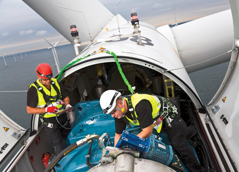 Fig. 6. A service team works atop a 2.3-MW wind turbine at Sweden's Lillgrund offshore wind farm. Image courtesy of Siemens.