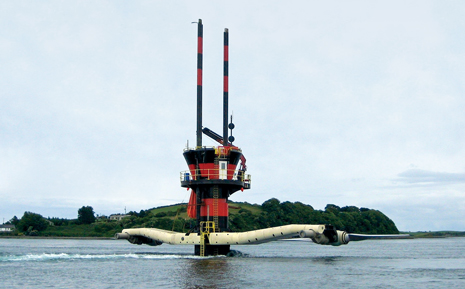 Fig. 8. The SeaGen prototype uses twin 16-m-diameter tidal-wave-driven rotors to generate 1.2 MW at a current velocity of 2.4 m/s. Image courtesy of Marine Current Turbines.