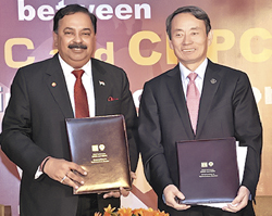 An international E&P partnership: Sudhir Vasudeva, CMD, ONGC (left), and Jiang Jiemen, CNPC Chairman.