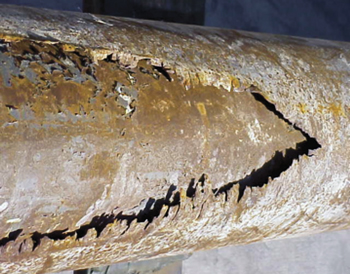 Fig. 2. Improper mill selection or milling procedures, or window placements in poor/no cement quality casing depths can lead to inadequate window geometries, creating a potential for severe damage to the solid expandable tubulars (Grant 2005). Fig. 2. Improper mill selection or milling procedures, or window placements in poor/no cement quality casing depths can lead to inadequate window geometries, creating a potential for severe damage to the solid expandable tubulars (Grant 2005).