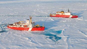The Canadian Coast Guard icebreaker Louis S. St. Laurent (foreground) and the US Coast Guard icebreaker Healy. Courtesy of Natural Resources Canada.