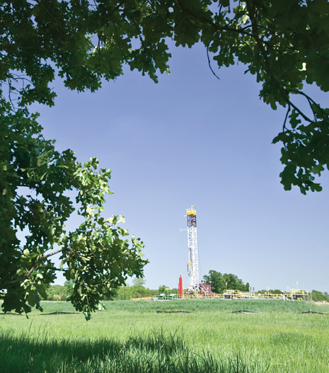 A rig drills in the Fayetteville shale of Arkansas on behalf of dominant operator Southwestern Energy. The firm now has nearly one million acres under lease in the play.