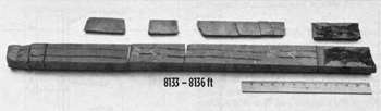 Fig. 2. Recovered oriented core split by an induced hydraulic fracture Fig. 2. Recovered oriented core split by an induced hydraulic fracture
