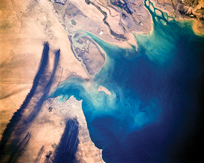A NASA satellite photo from 1991 shows smoke billowing from the burning Kuwaiti oil wells.