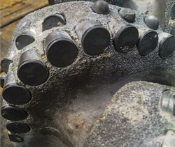 Fig. 2. A FuseTek bit fitted with HeliosImpact cutters drilled 10,700 ft with only minimal wear. Fig. 2. A FuseTek bit fitted with HeliosImpact cutters drilled 10,700 ft with only minimal wear.