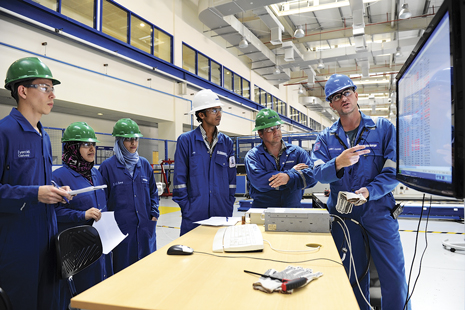 Fig. 1. Recent graduates at one of the Schlumberger worldwide training facilities. 