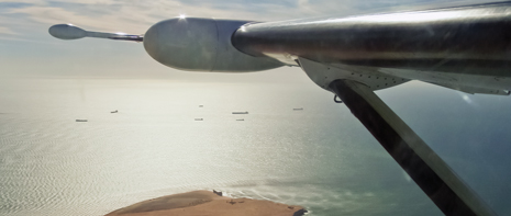 A plane captures data during an airborne gravity gradiometry survey for ARKeX. A plane captures data during an airborne gravity gradiometry survey for ARKeX.